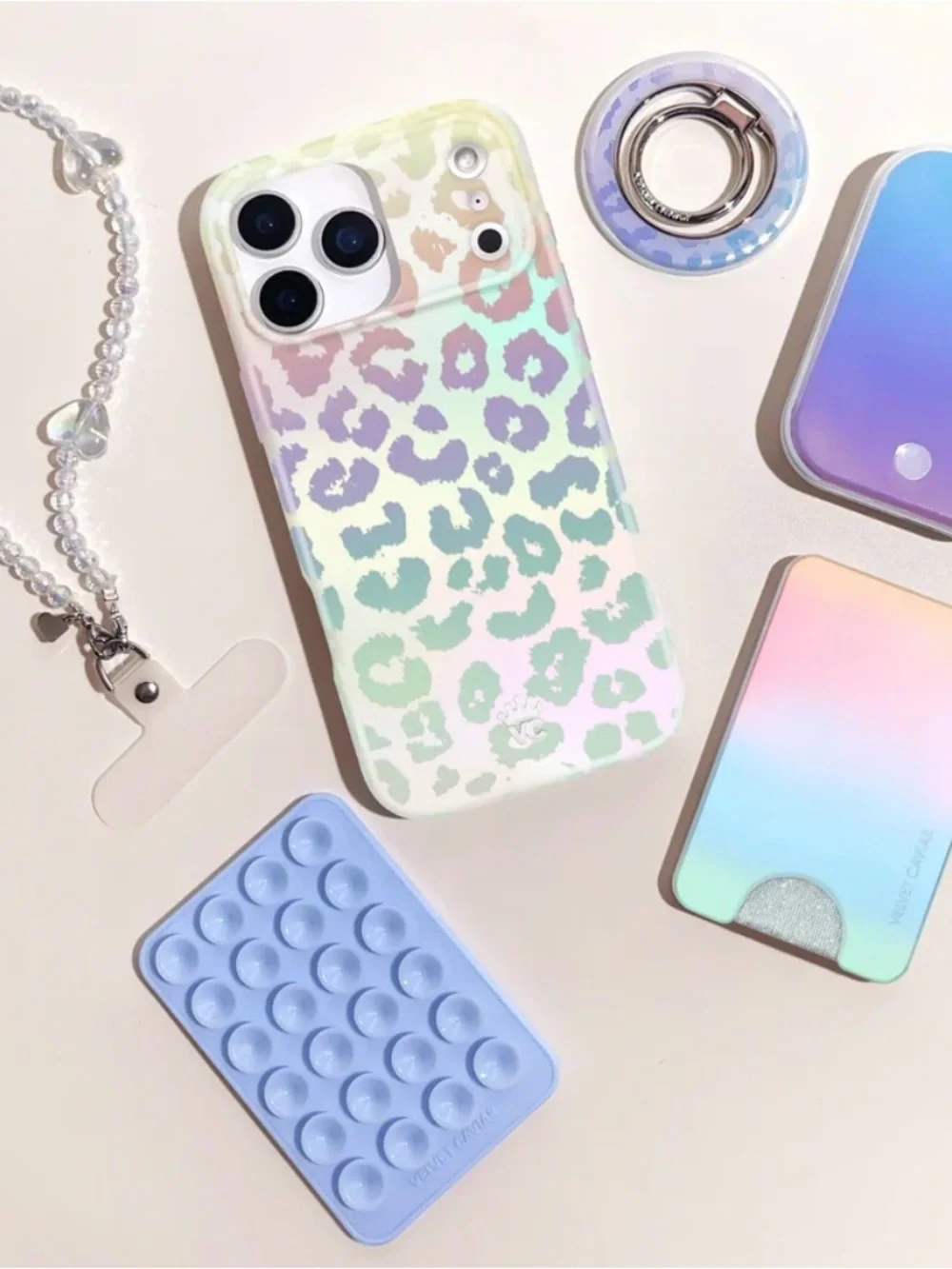 Velvet Caviar Holographic Leopard MagSafe Case in Iridescent Pastel